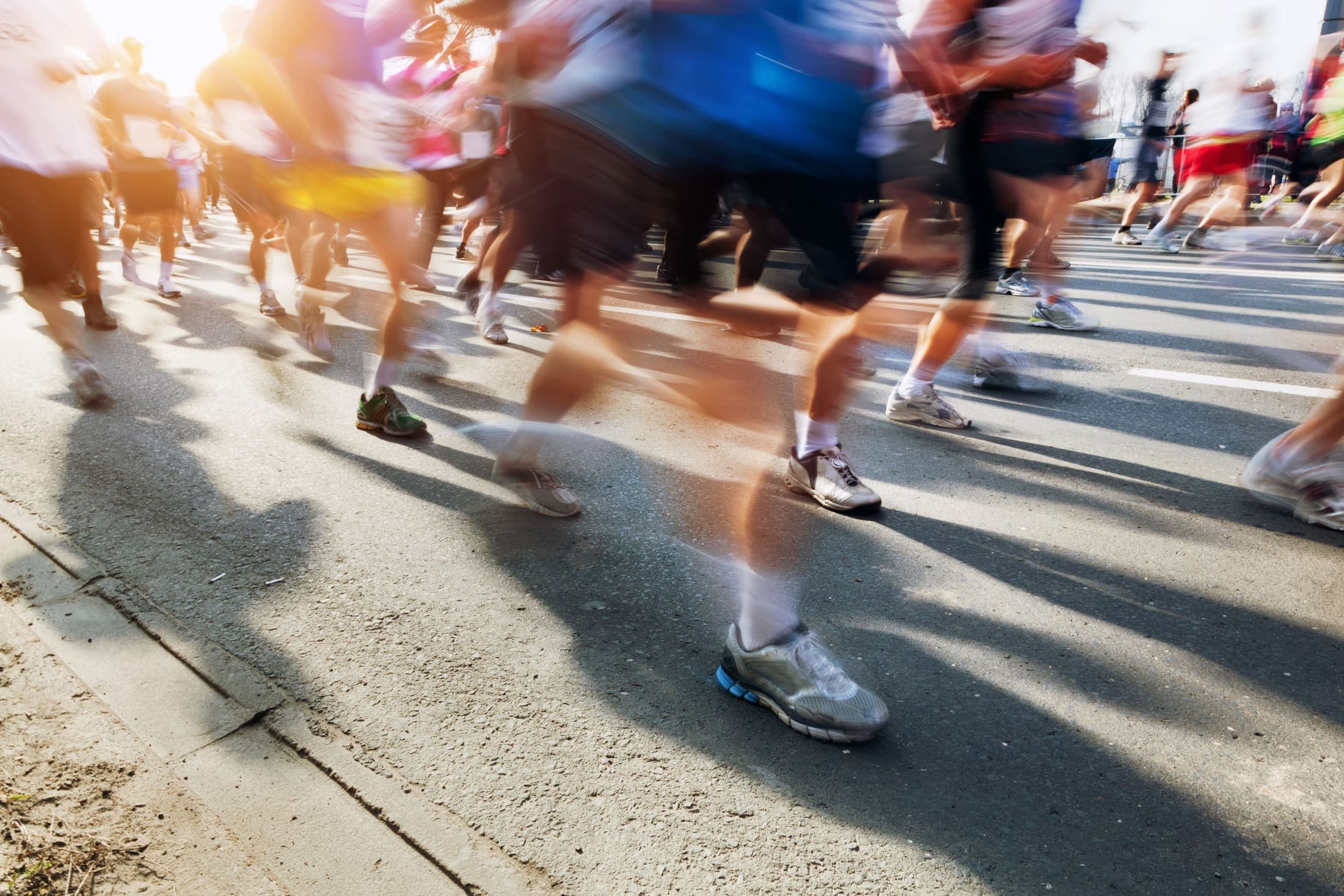 Marathon runners on city road